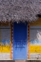 Blue-door;-Comoros-Archipelago;-Detail;-France;-Hut;-Indian-Ocean;-Kaleidos;-Kaleidos-images;-La-parole-à-limage;-Laurent-Abad;-Mayotte;-Painted-façade;-Stories-Pictures;-Thatched-roof;-Traditional-architecture